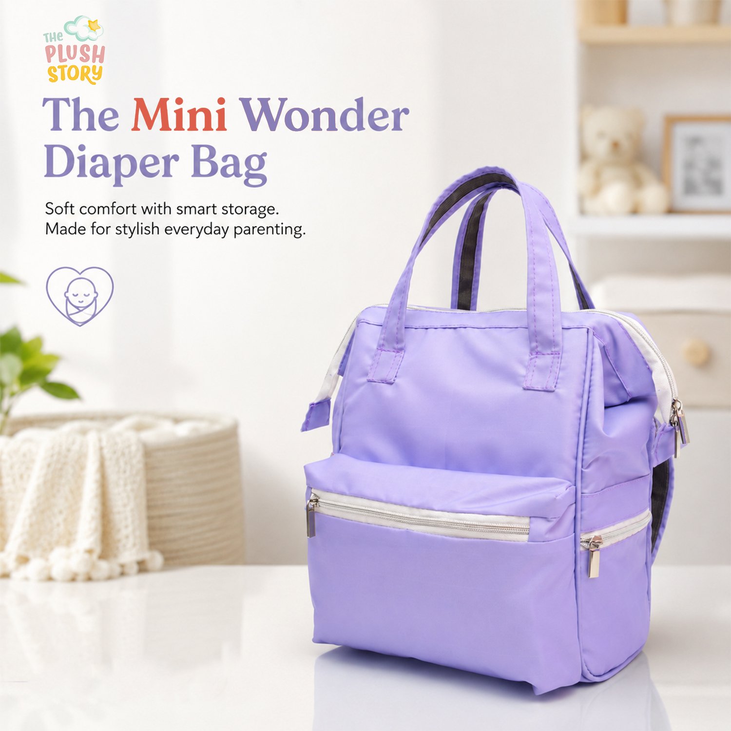 Purple mini diaper bag with multiple zipped pockets sits on a white surface, background showing 'The Plush Story' logo and product name 'The Mini Wonder Diaper Bag'.