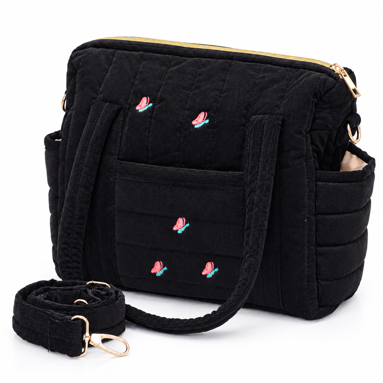 Black quilted shoulder bag with small pink flamingo embroidery and gold zipper, detachable strap included.